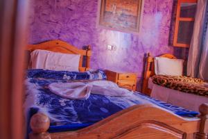 Postel nebo postele na pokoji v ubytování Auberge Toubkal