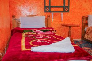 Postel nebo postele na pokoji v ubytování Auberge Toubkal