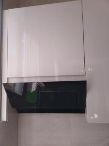 Kuchyň nebo kuchyňský kout v ubytování Apartment Cozy House 1