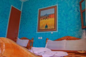 Postel nebo postele na pokoji v ubytování Auberge Toubkal