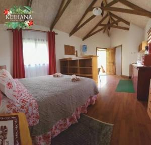 Postel nebo postele na pokoji v ubytování Cabañas Keihana Rapa Nui