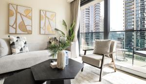 Χώρος καθιστικού στο HomesGetaway -Lavish 1BR in ACT One Downtown Dubai