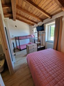 Postel nebo postele na pokoji v ubytování Dimore d'Oltremare - Appartamento Levante