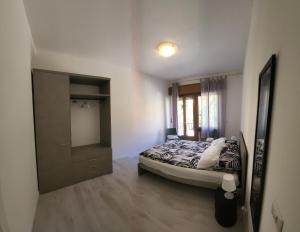 Ένα ή περισσότερα κρεβάτια σε δωμάτιο στο Casa Camoscio Piano 1