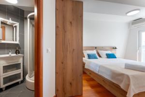 Postel nebo postele na pokoji v ubytování Apartman Zdravka