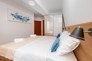 Postel nebo postele na pokoji v ubytování Apartman Zdravka