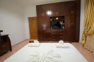Postel nebo postele na pokoji v ubytování Villa Kevin's