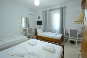 Postel nebo postele na pokoji v ubytování Villa Kevin's