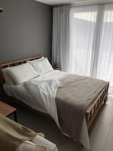 Postel nebo postele na pokoji v ubytování Aifin bonito monoambiente + 11 fotografií