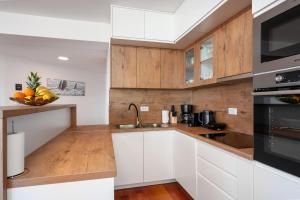 Kuchyň nebo kuchyňský kout v ubytování Apartman Zdravka
