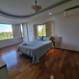 Postel nebo postele na pokoji v ubytování Master suite
