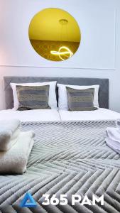 Postel nebo postele na pokoji v ubytování Apartament Gold - 365PAM