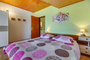 Postel nebo postele na pokoji v ubytování Apartments Petra