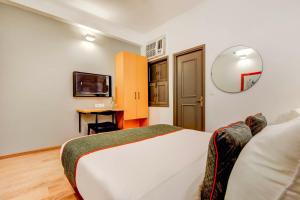 TV a/nebo společenská místnost v ubytování Hotel O Star Key + 37 fotografií