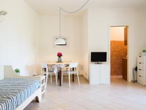 Televisyen dan/atau pusat hiburan di La Rotonda Cottages - Klodge