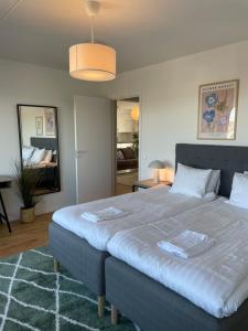 Ένα ή περισσότερα κρεβάτια σε δωμάτιο στο GoCo Health Innovation City - Mölndal