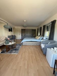 Postel nebo postele na pokoji v ubytování MTL Schweiz Apartments