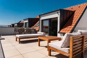 Balkón alebo terasa v ubytovaní Rodinný apartmán s výhledem na zámek