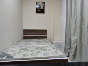 Postel nebo postele na pokoji v ubytování Hostel Sharjah