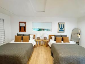 Ein Bett oder Betten in einem Zimmer der Unterkunft Luminous Home with Pool and Views