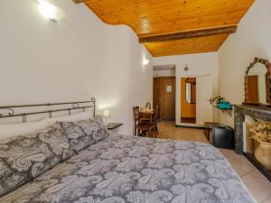 Postel nebo postele na pokoji v ubytování Macaia Room #1 with AC