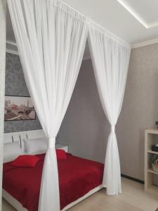 Postel nebo postele na pokoji v ubytování Асташкина