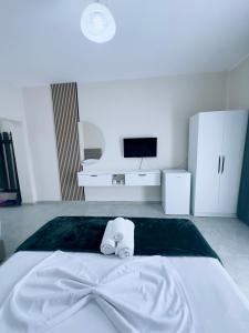 Postel nebo postele na pokoji v ubytování Molla Hotel Restorant