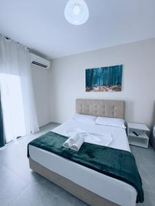 Postel nebo postele na pokoji v ubytování Molla Hotel Restorant