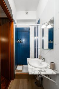 Koupelna v ubytování Hotel City Center + 37 fotografií
