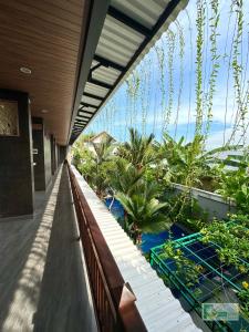 a view from the balcony of a resort at Casa Verde Guest House in Sempidi