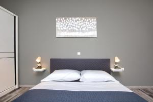 Ein Bett oder Betten in einem Zimmer der Unterkunft Holiday House Ulika near Pula - Pet Friendly