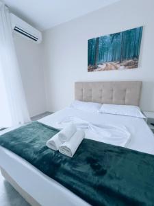 Postel nebo postele na pokoji v ubytování Molla Hotel Restorant