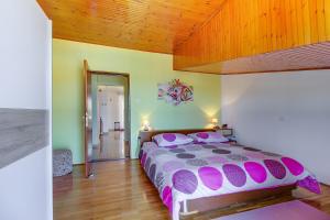 Postel nebo postele na pokoji v ubytování Apartments Petra