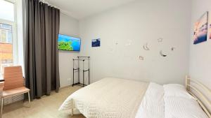 TV a/nebo společenská místnost v ubytování Centerline Apartments