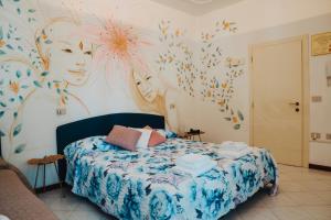 Postel nebo postele na pokoji v ubytování Hotel Julia