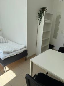 Postel nebo postele na pokoji v ubytování Guesthouse Hune
