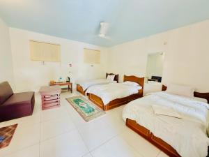 Letto o letti in una camera di Hotel Mantra and Adventure