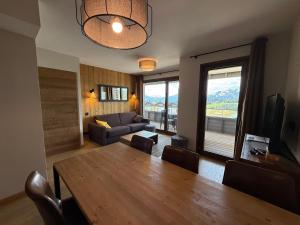 Μια τηλεόραση ή/και κέντρο ψυχαγωγίας στο Appartement Neuf aux Saisies - 6 Pers, 52m², 3 Pièces, Grand Balcon, Parking Couvert - FR-1-293-241