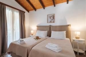 Posteľ alebo postele v izbe v ubytovaní Kalamionas Studios & Apartments