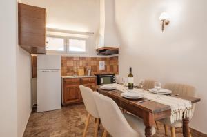 Kuchyňa alebo kuchynka v ubytovaní Kalamionas Studios & Apartments