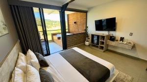 TV o dispositivi per l'intrattenimento presso Rooca Habitat Guatape