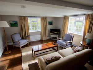 Et opholdsområde på Luxury 3 Bed Cottage on Rewilding Estate