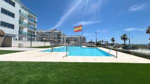 Bazén v ubytování Dunas Beach Apartment nebo v jeho okolí
