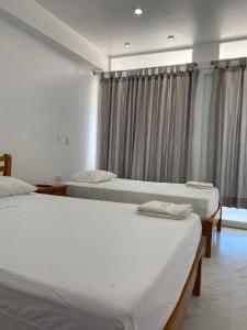 Postel nebo postele na pokoji v ubytování Habitación Suite Standard