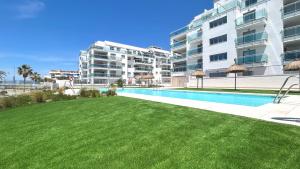 Bazén v ubytování Dunas Beach Apartment nebo v jeho okolí