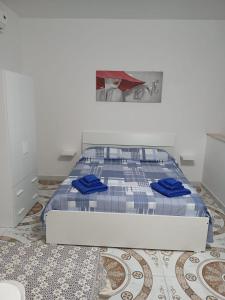 Ένα ή περισσότερα κρεβάτια σε δωμάτιο στο Casa Oasy Pompei 2