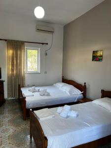 Postel nebo postele na pokoji v ubytování Villa Andres