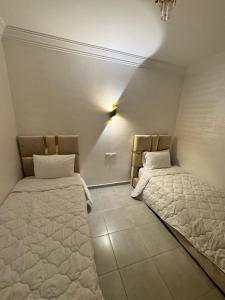 Una cama o camas en una habitación de Le paradis du surf 16 fotos más