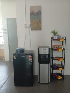 Η κουζίνα ή μικρή κουζίνα στο Bajet Homestay - Teratak Singgah