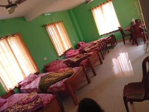 Ένα ή περισσότερα κρεβάτια σε δωμάτιο στο Cherry'z home stay